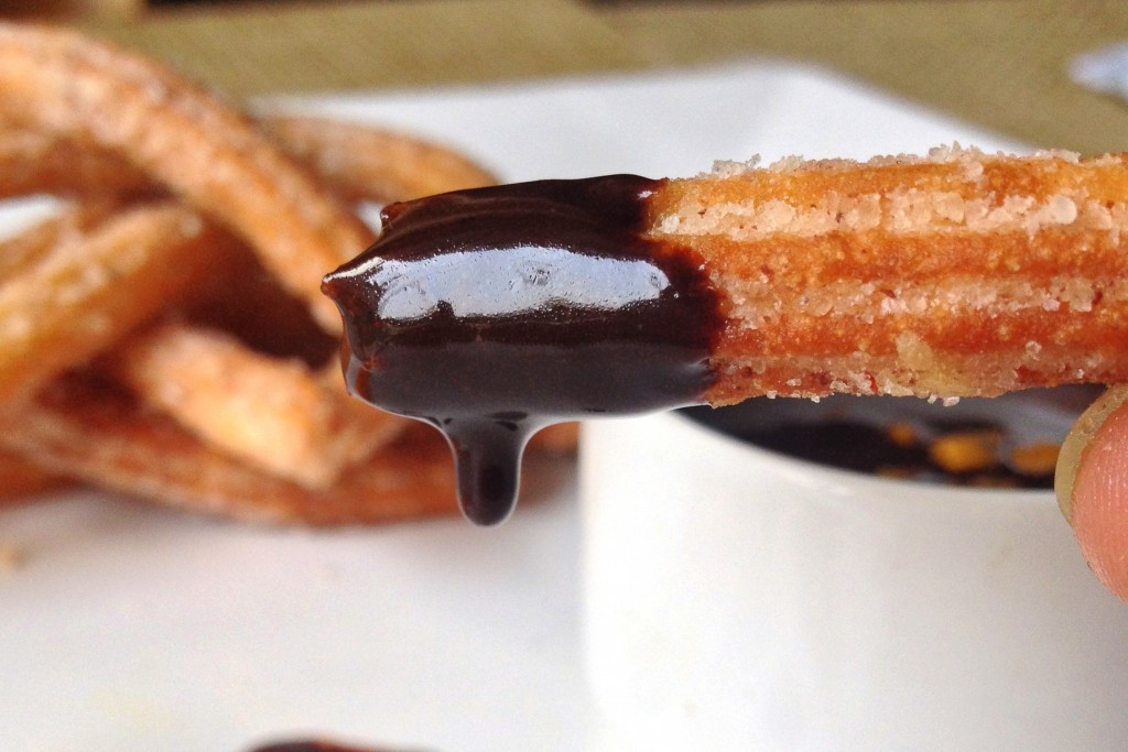Churros with orange flavoured chocolate sauce